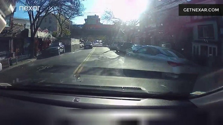 An approaching vehicle creates an imminent collision risk